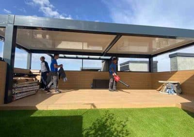 PERGOLA BIOCLIMATICA CON CORTINA DE CRISTAL Y TECHO FIJO EN ATICO VALDEBEBAS MADRID 1