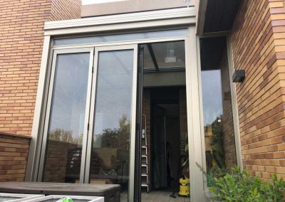 TECHO FIJO CON CERRAMIENTO VERTICAL REPLEGABLE EN TERRAZA DE MADRID CENTRO 6