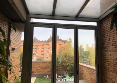 TECHO FIJO CON CERRAMIENTO VERTICAL REPLEGABLE EN TERRAZA DE MADRID CENTRO 7