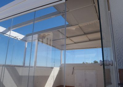 Techo Movil y Cortina de Cristal en terraza atico